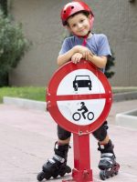 Cheerful child on his roller skate